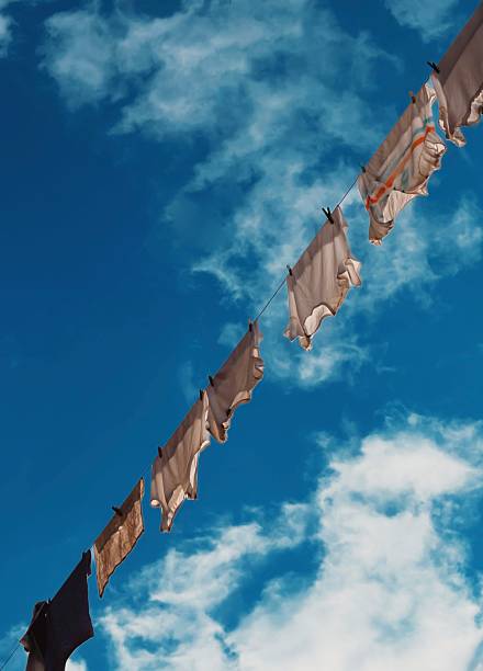istock A line of clothes hanging on a clothesline 2227810371