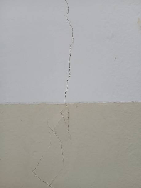 istock White and yellow wall, close-up view, home interior, modern living, copy space 2227811609