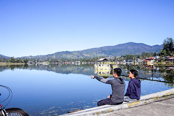 View over the large Lake Toba in the enormous volcanic crater in the northern part of Sumatra