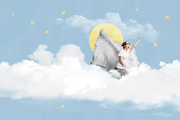Creative collage young girl clouds sky environment pillow sleepwear dream imagination raise hand superhero excited happiness bedtime.