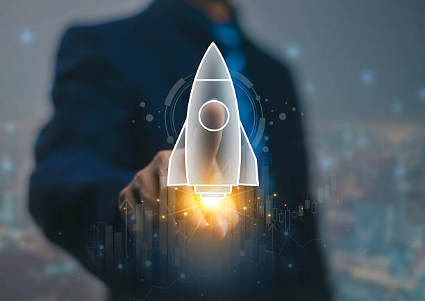 istock Startup business start-up with technology background as a rocket image conveying the idea of ​​launching a well-planned new business. 2227821380