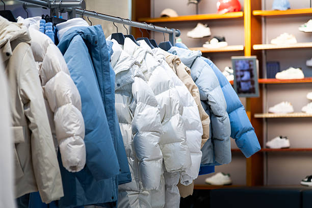 Winter down jackets hanging in the store