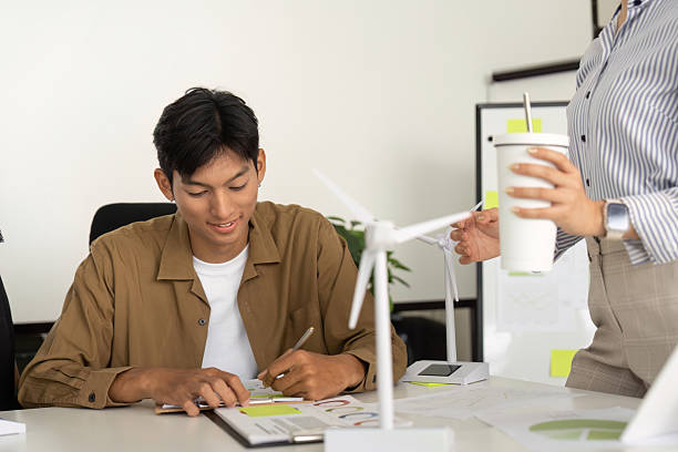 istock Sustainability Efforts: Young Professional Working on Eco-Friendly Project 2227831424
