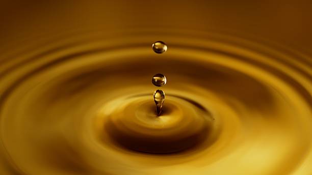 istock Freeze Motion of Splashing Whiskey or Cider Drop 2227831903