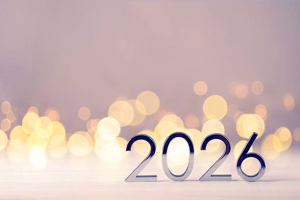 istock Metal numbers 2026 on table with bokeh lights. 2227834635