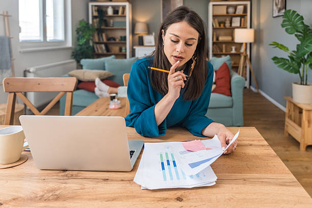 istock Young freelance business finance woman has a problem with attention deficit hyperactivity disorder ADHD she cant start work on project Female lost concentration cant work from home on laptop computer 2227836804