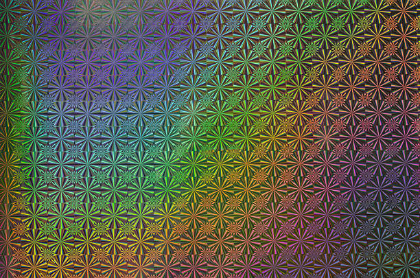 A vibrant, full-frame background with a repeating starburst pattern and a colorful, iridescent holographic effect