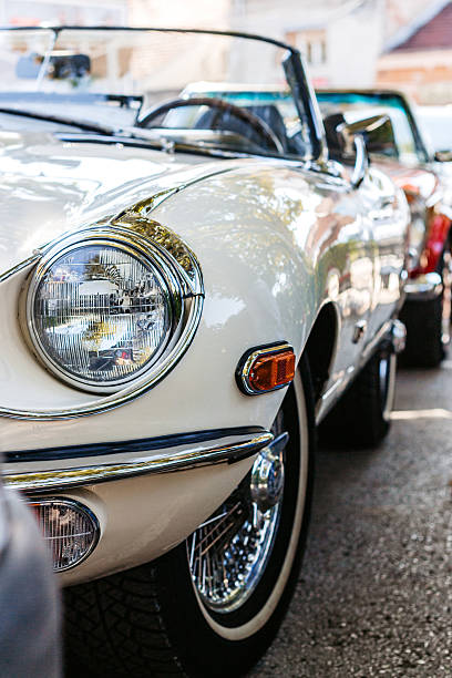 istock Headlight Of A White Old-timer Car 2227837430