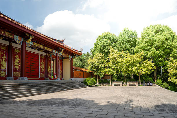 istock A Traditional Chinese Temple with Ancient Charm and Lush Greenery Surrounding It 2227839741