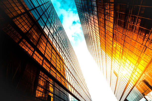 istock Golden skyscrapers reflecting the sunset in a modern metropolis 2227846129