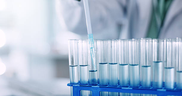 istock Science, liquid and test tubes with chemical in laboratory for experiment, research or project. Pharmaceutical, pipette and person with glass vials with solvent for medical innovation or analysis. 2227846313