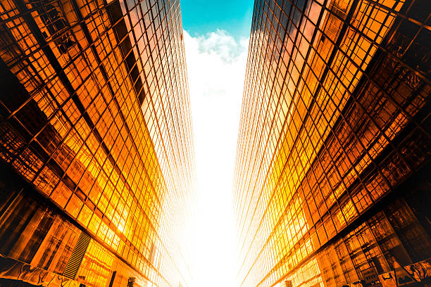 istock Golden skyscrapers reflecting the sunset in a modern metropolis 2227846631