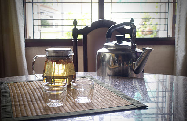 istock Fresh rose tea in a glass teapot set 2227847601