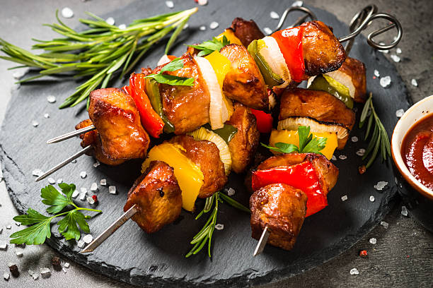 istock Shish kebab at skewers with vegetable. 2227849479