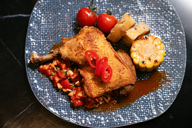 Crispy Chicken Leg with Grilled Vegetables and Fresh Salsa