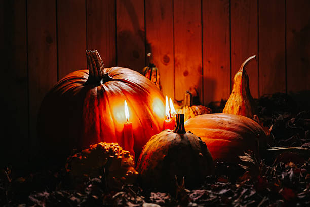 Pumpkins and Candles for Autumn Celebration