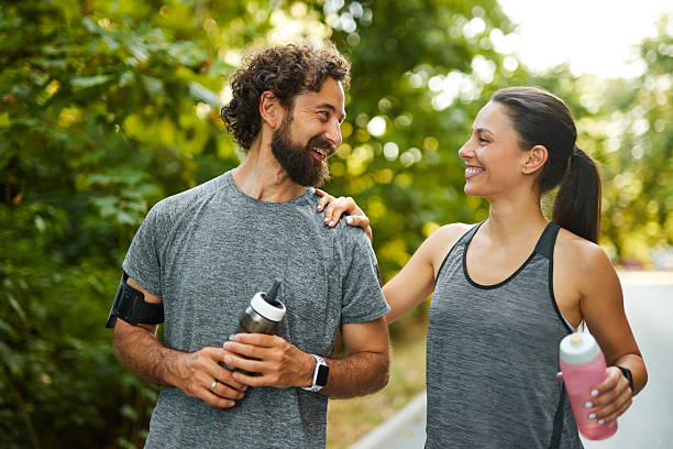 istock Smiling couple enjoying outdoor exercise together 2227854260