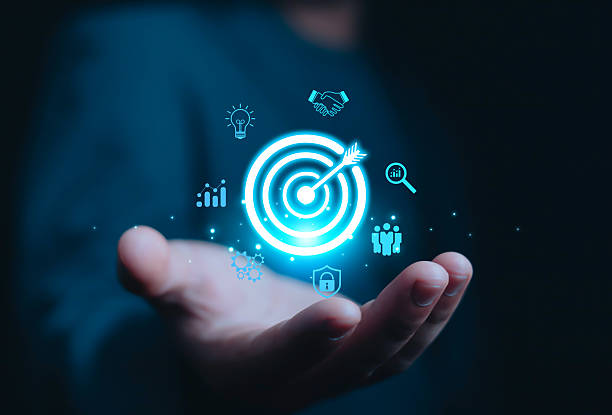 istock Businessman hold virtual target icons 2227854679