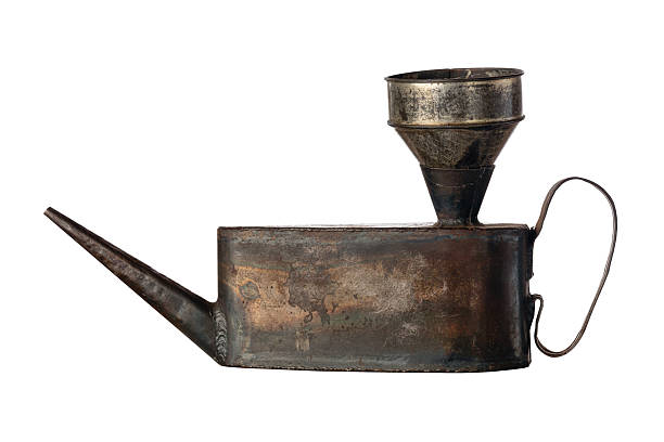 istock Old vintage rusty oil can isolated on white background 2227858762
