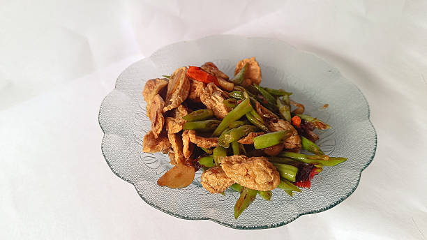 istock Stir-Fried Fish Tempura with Long Beans on Plate 2227859899