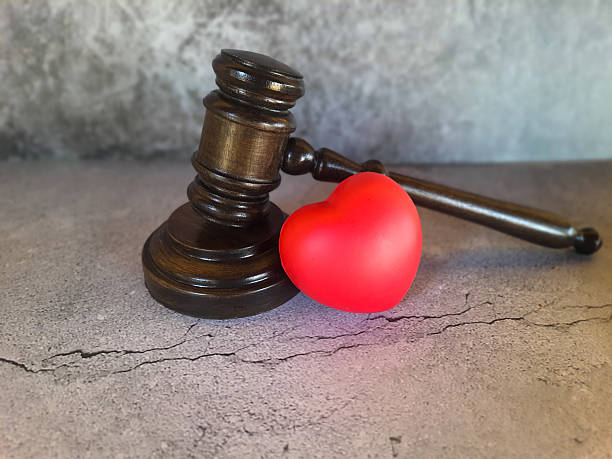 istock Judge's gavel with red heart 2227860905