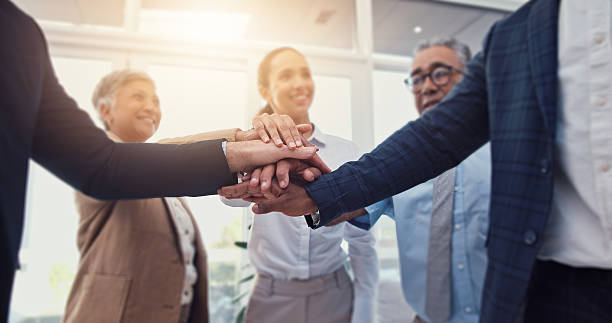 istock Business people, hands together and teamwork, support or collaboration with company goals, success or mission. Employees, professional group and circle with stack for job, target and staff synergy 2227865526