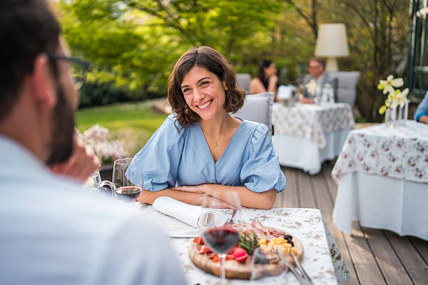 istock Diverse Couple Enjoys Alfresco Dining Experience 2227867642