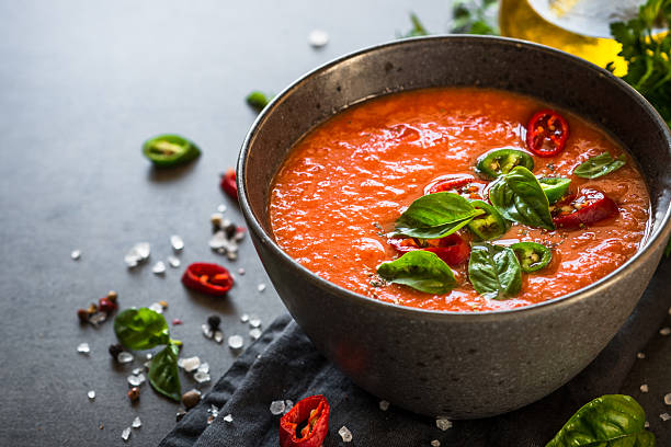 istock Tomato soup or gazpacho at black table. 2227868585