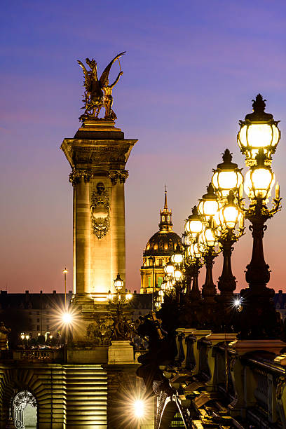 istock Paris : Alexandre III bridge by night with view on Invalides dome 2227869300