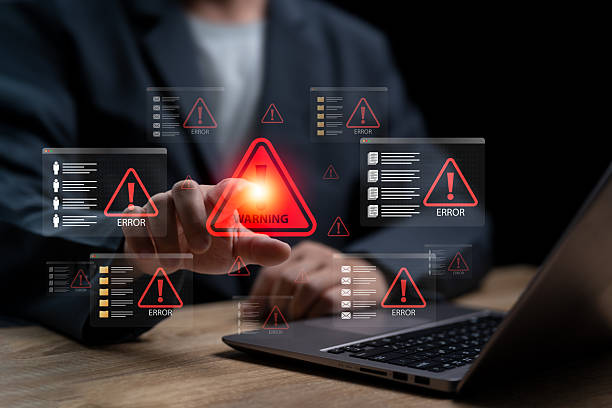 istock System Error and Cyber Attack Alert on laptop concept, Businessman error warning was found on system during operation, Data Breach and Malware Infection During Work, Data protection, Email, Document 2227870225