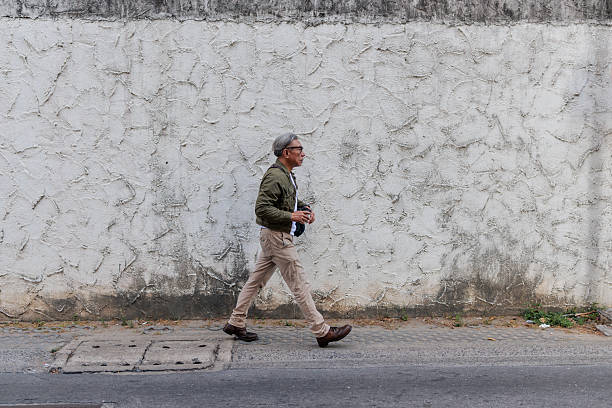 istock Stylish Mature Man on a City Walk 2227876853