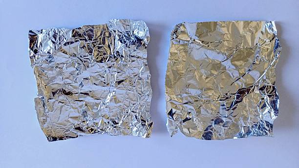 istock Square cut aluminum foil on a white background. message box, backgrounds, text space. 2227879485