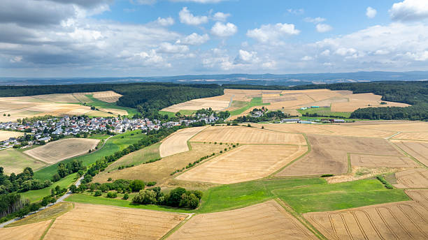 istock Agricultural fields and rural scene - aerial view 2227882523