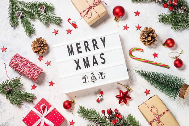 istock Christmas background with fir tree, present box and decorations. 2227884450