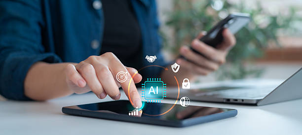 istock Woman using tablet and smartphone with AI interface, business icons, and data protection, representing artificial intelligence in smart technology and business process. 2227885951
