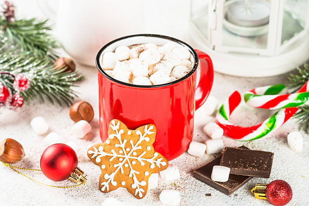 istock Hot chocolate with marshmallow and christmas cookies at white table. 2227886605