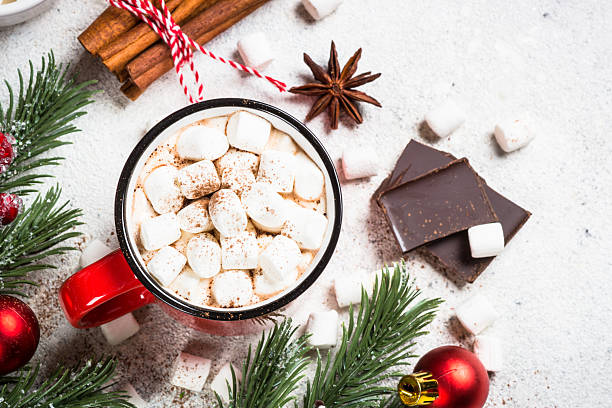 istock Hot chocolate with marshmallow and christmas cookies at white table. 2227887224