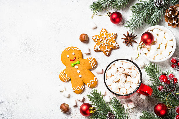 istock Hot chocolate with marshmallow and christmas cookies at white table. 2227887237