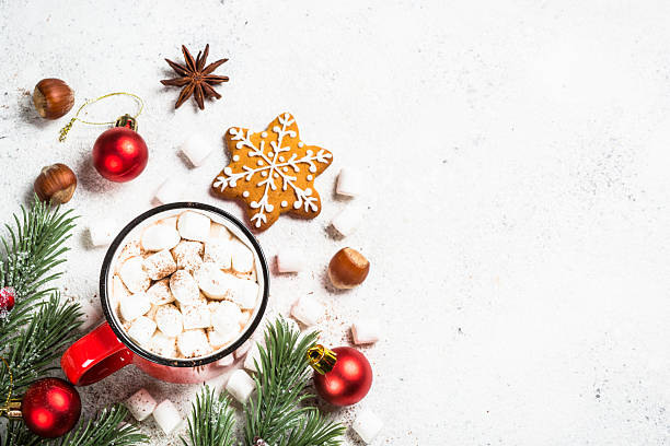 istock Hot chocolate with marshmallow and christmas cookies at white table. 2227887246