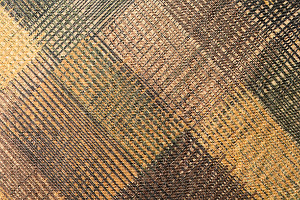 part of a wall with brown tiles.
