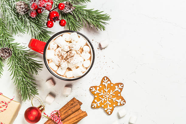 istock Hot chocolate and gingerbread cookies at white table. 2227887300