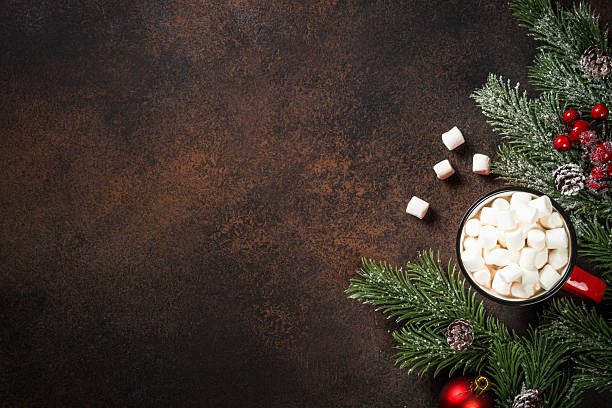 istock Hot chocolate with marshmallow at dark table. 2227887377