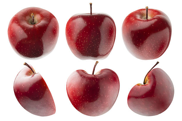 istock Juicy red apples rich set, whole and cut on half, with tails, different,  sides, studio shot, isolated on white background. Summer fresh natural fruits as design elements. 2227888630