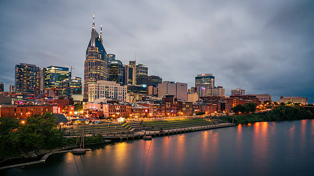 October 14, 2023, Nashville, TN: Riverside view of the skyline of Nashville, Tennessee after sunset