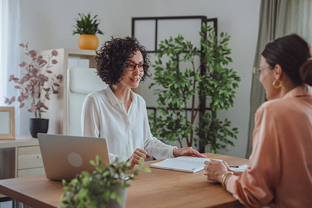 istock Two businesswomen working together on a project in the office 2227899377