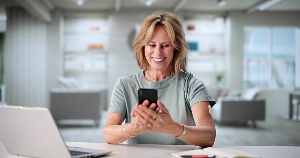istock Senior Woman Using Digital Continuous Glucose Monitor 2227904797