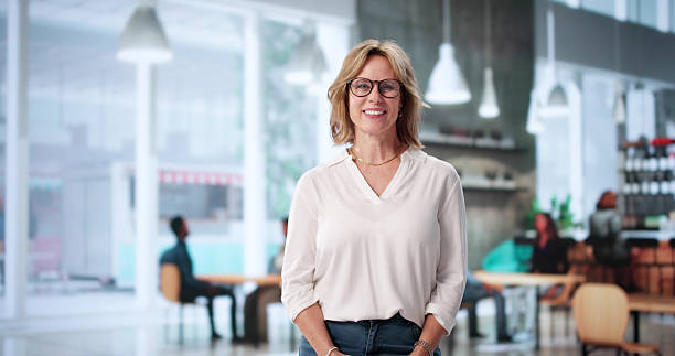 istock Smiling Cafe Owner In Apron Holding Tablet 2227904800