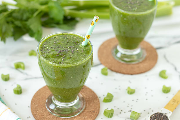istock Green celery smoothie with chia seeds on white kitchen table 2227910649
