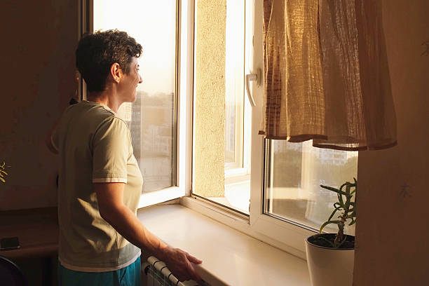istock Woman embracing new beginnings at sunrise 2227912061