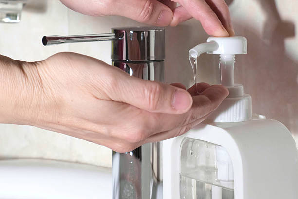 istock Pressing liquid soap dispenser in bathroom 2227913188